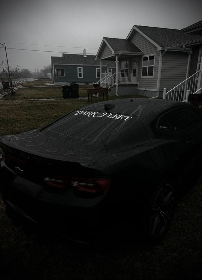 Darkfleet Camaro with banner sticker in rain